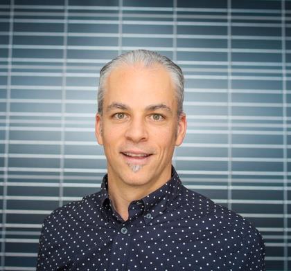 Portrait of Danin Kahn, Founding Principal at GrowthStream